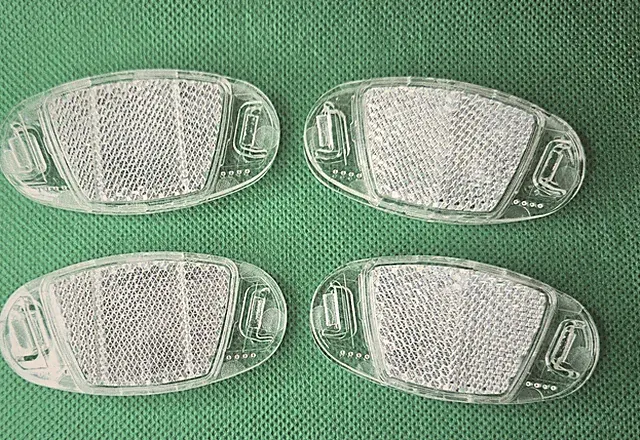Bicycle Wheel Spoke Reflectors Set Of 4. Length is 2 3/4" Width is 1 1/2"
